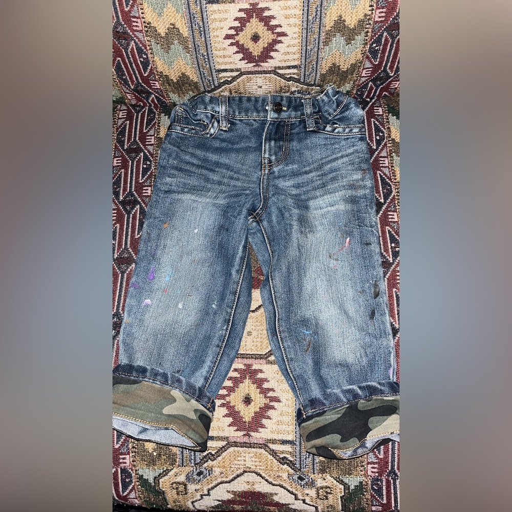 Size 4t jeans with camo cuffs on bottom